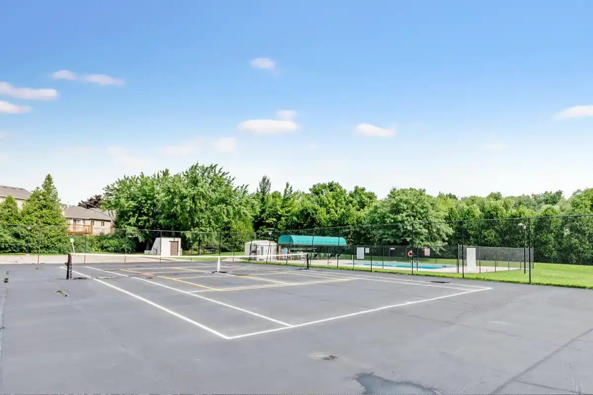 Outdoor pool and tennis court.